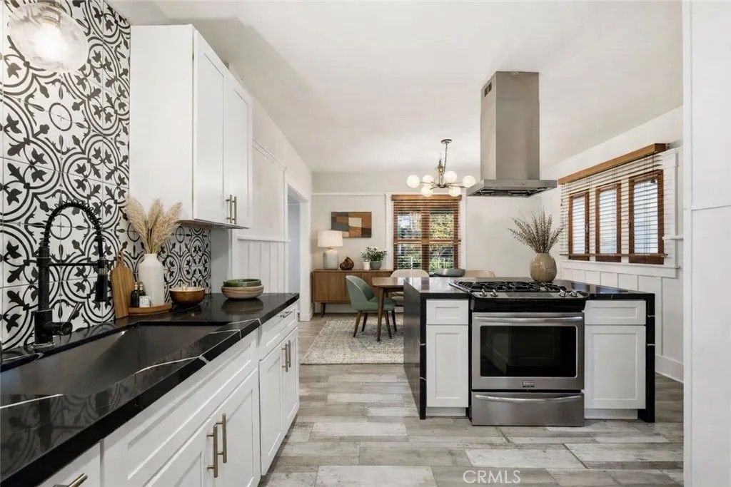 Photo of 505 N Avenue 65, Los Angeles, CA 90042 (MLS # SB26070787)