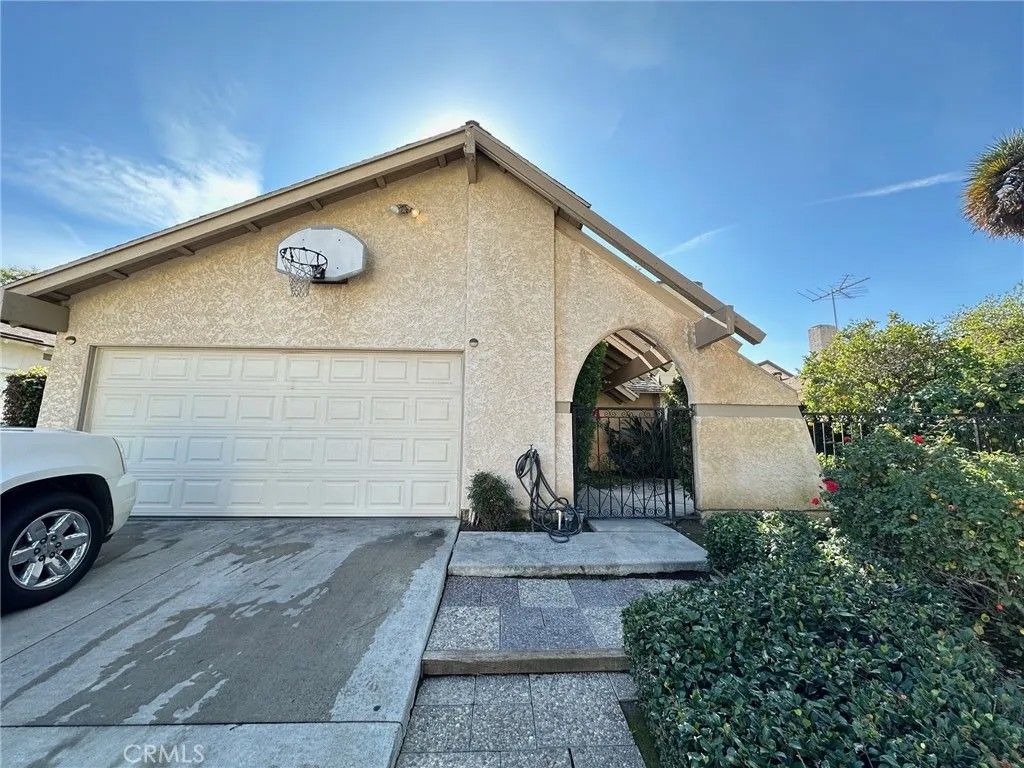 Photo of 11644 Bos Street, Cerritos, CA 90703 (MLS # PW25271904)