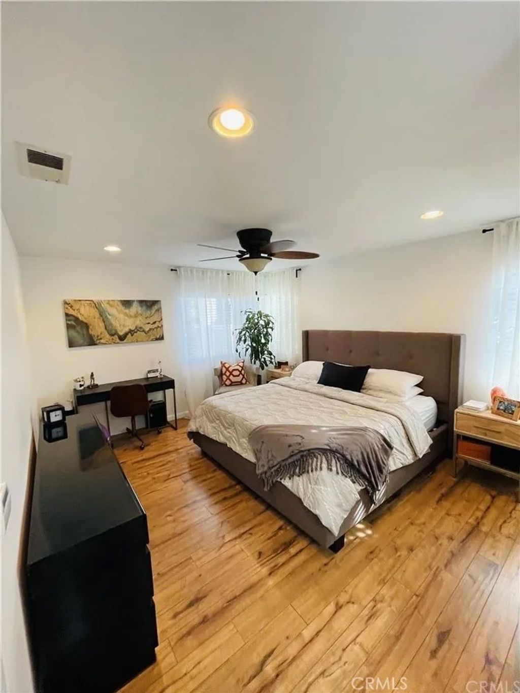 Photo of 7881 Woodlake Dr, Huntington Beach, CA 92647 (MLS # OC25237064)