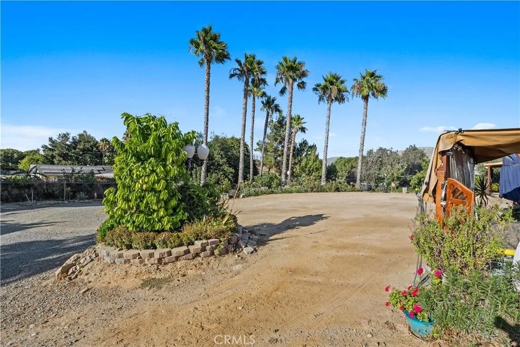Photo of 19059 Diplomat Avenue, Corona, CA 92881 (MLS # IG25189447)