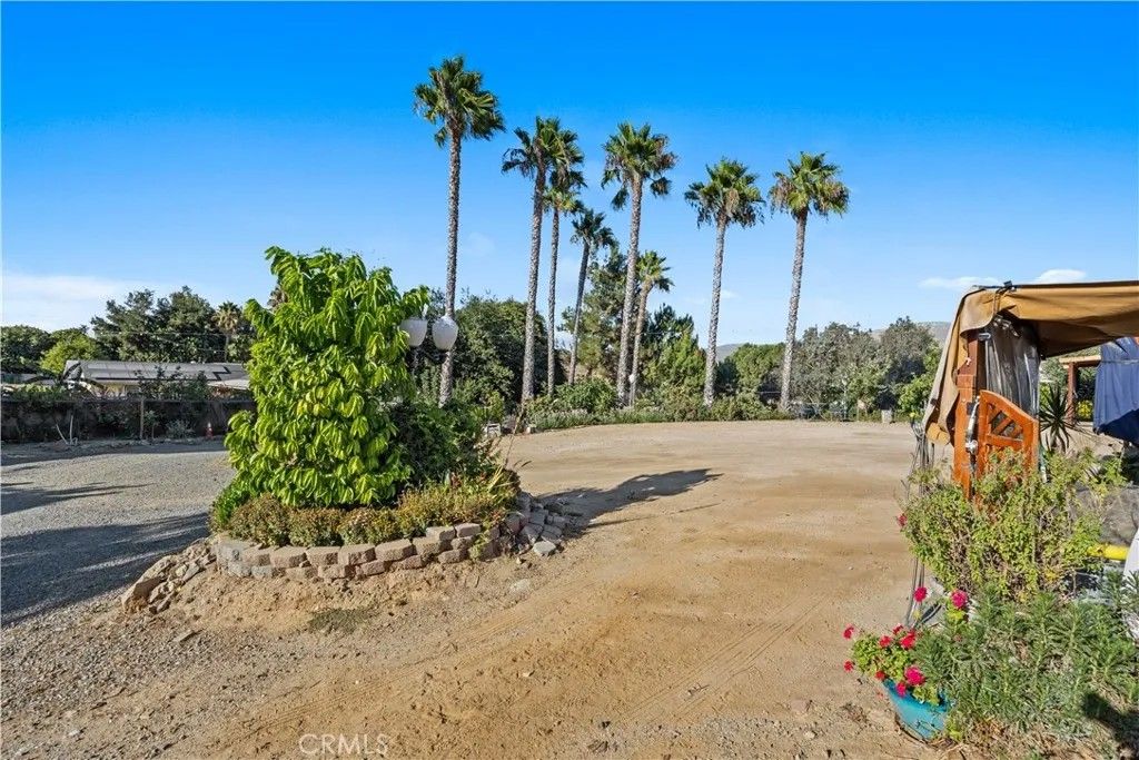 Photo of 19059 Diplomat Avenue, Corona, CA 92881 (MLS # IG25189447)
