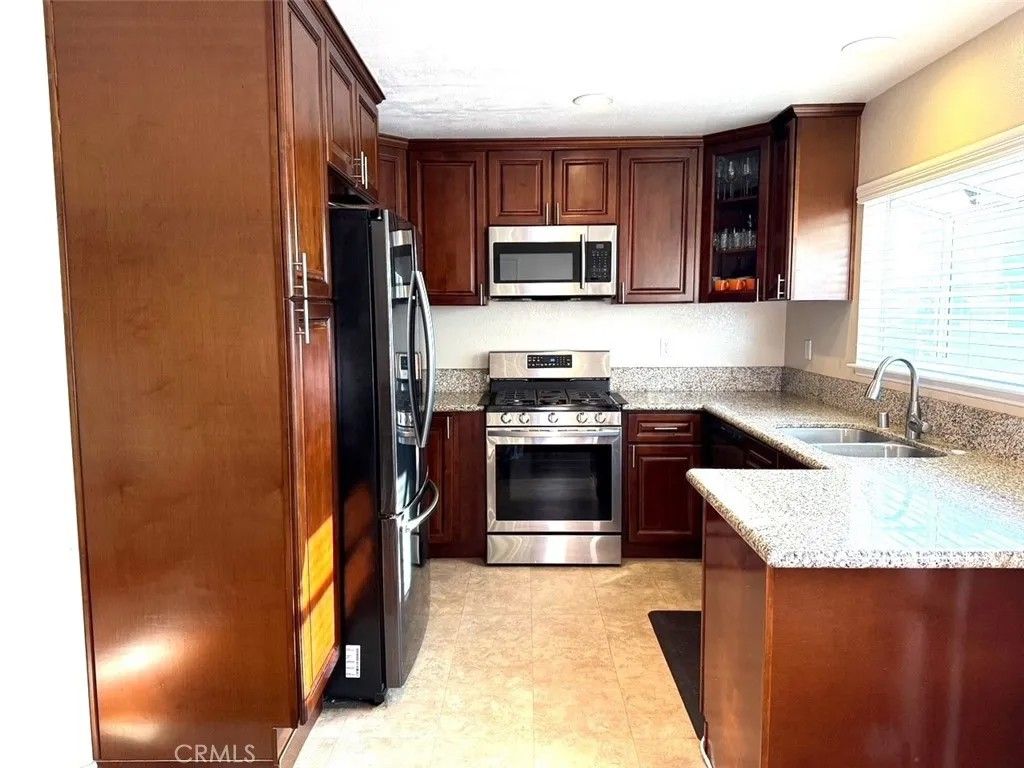 Photo of 13018 Sycamore Village Drive, Norwalk, CA 90650 (MLS # RS26097863)