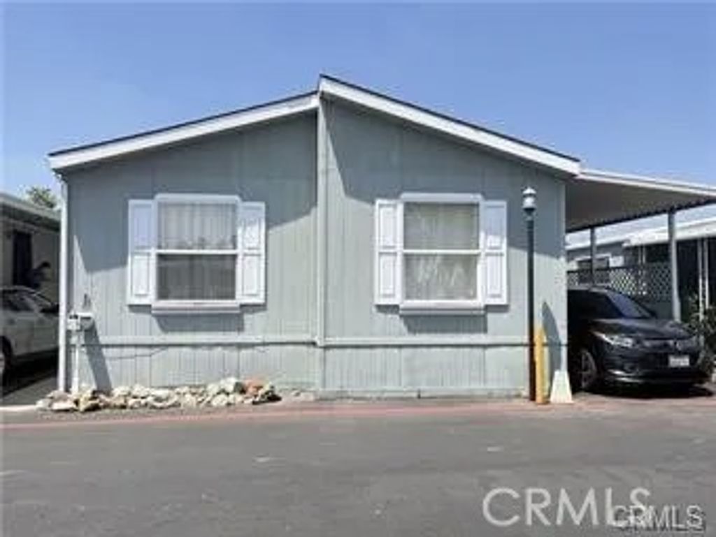 Photo of 716 N Grand Ave #E2, Covina, CA 91723 (MLS # CV25265993)