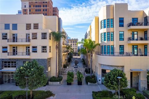 Photo of 133 The Promenade #103, Long Beach, CA 90802 (MLS # PW25278422)