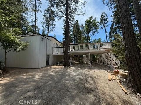 Photo of 39671 E Idylwild, Bass Lake, CA 93604 (MLS # NS26140590)