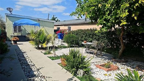 Photo of 1664 E 113th ST, Los Angeles, CA 90059 (MLS # CV26109195)