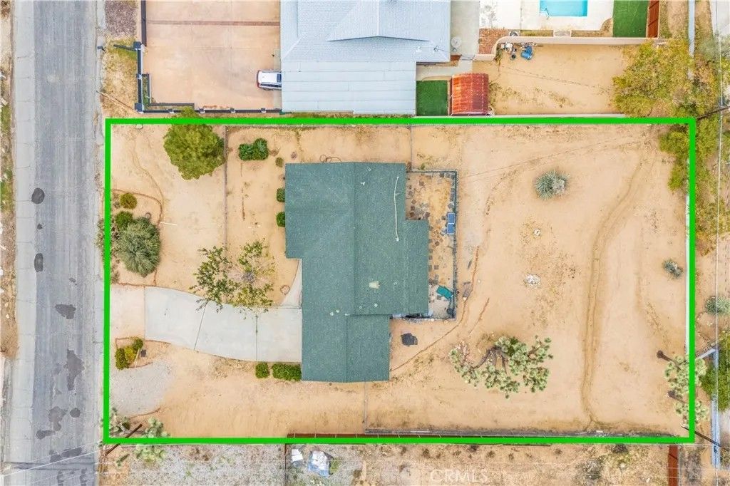 Photo of 7991 Amador Avenue, Yucca Valley, CA 92284 (MLS # JT25241072)