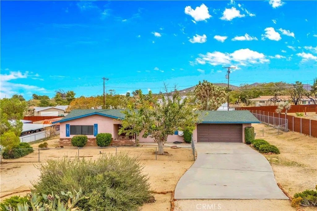 Photo of 7991 Amador Avenue, Yucca Valley, CA 92284 (MLS # JT25241072)