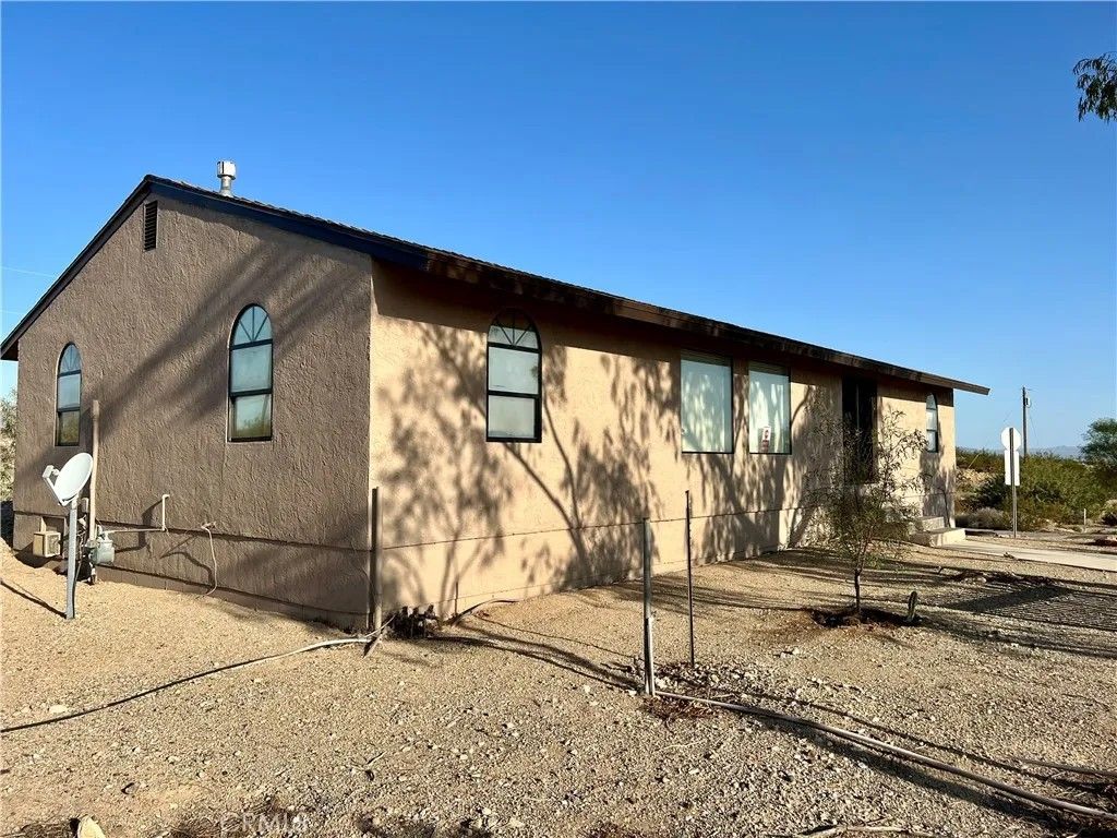 Photo of 99 Zoe Lane, Needles, CA 92363 (MLS # JT26070962)