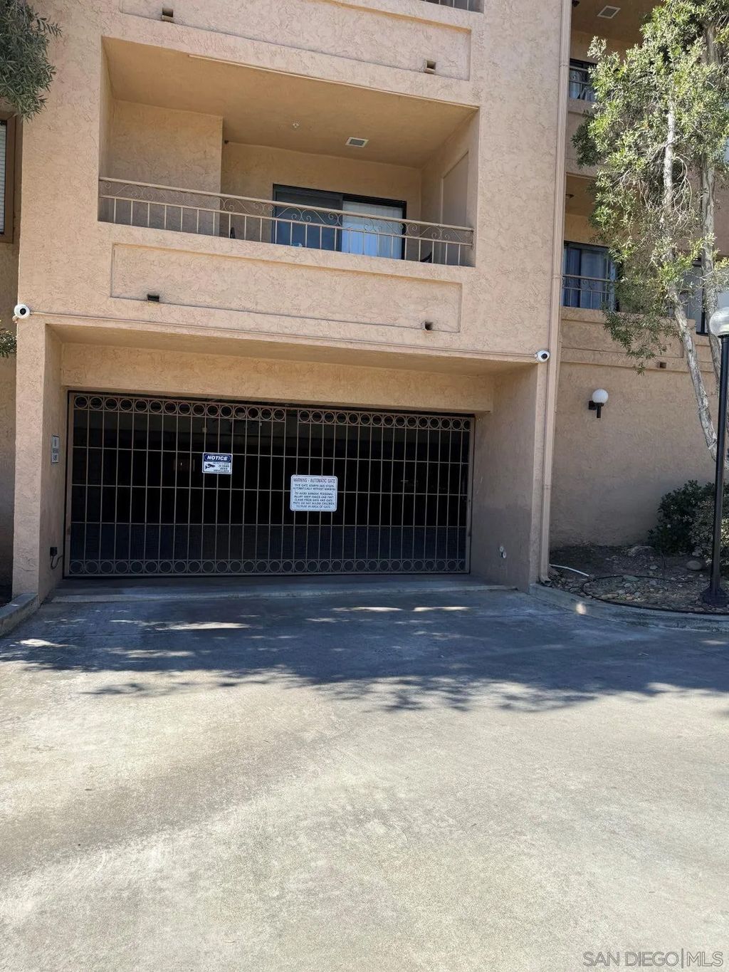 Photo of 5649 Lake Park Way #101, La Mesa, CA 91942 (MLS # 260002384)