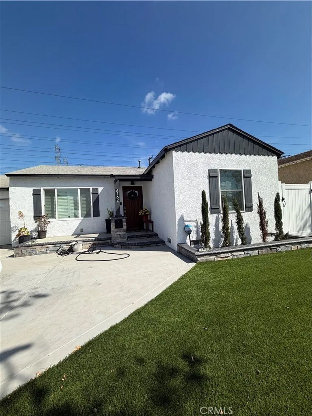 Photo of 6162 Eastbrook Ave, Lakewood, CA 90713 (MLS # CV26091142)
