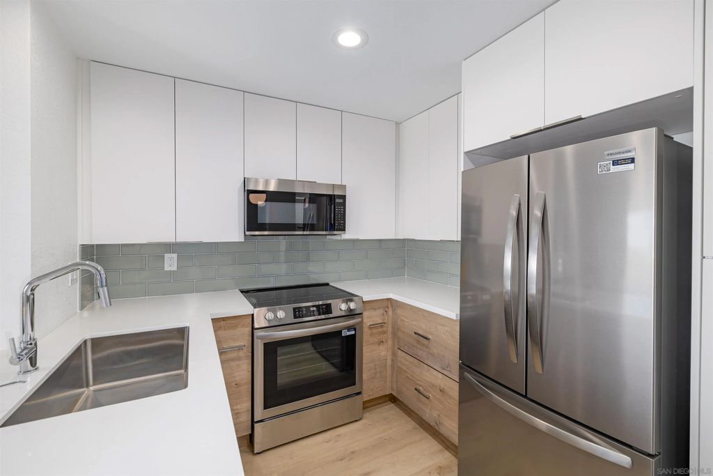 Photo of 3020 Cowley Way #208, San Diego, CA 92117 (MLS # 260008064)