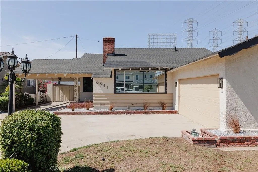 Photo of 6841 Millmark Ave, Long Beach, CA 90805 (MLS # DW26060934)