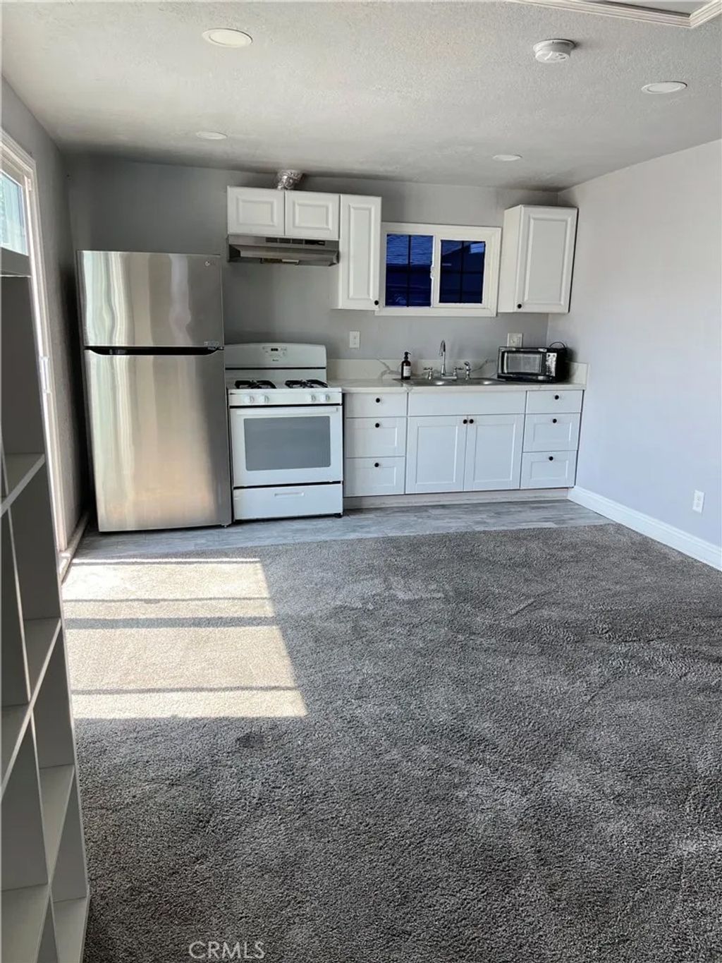 Photo of 7068 Calvin Avenue, Reseda, CA 91335 (MLS # SR26073454)