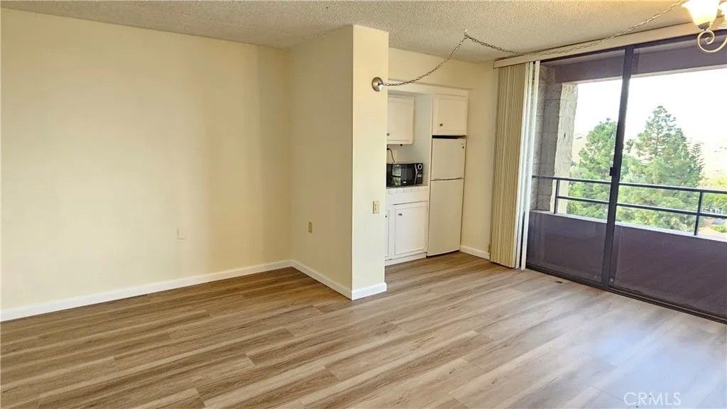 Photo of 24055 Paseo Del Lago #413, Laguna Woods, CA 92637 (MLS # OC26097216)