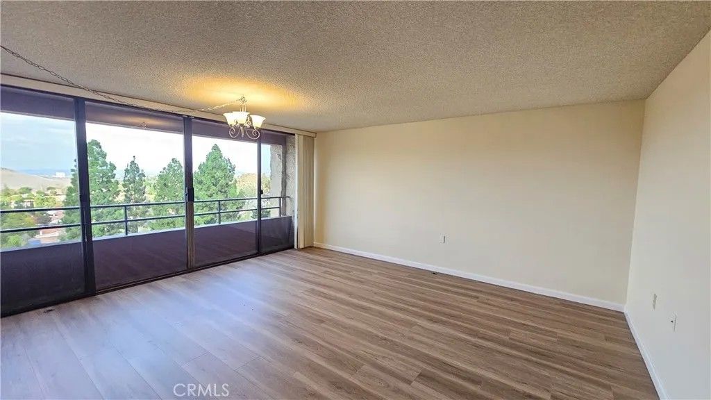 Photo of 24055 Paseo Del Lago #413, Laguna Woods, CA 92637 (MLS # OC26097216)