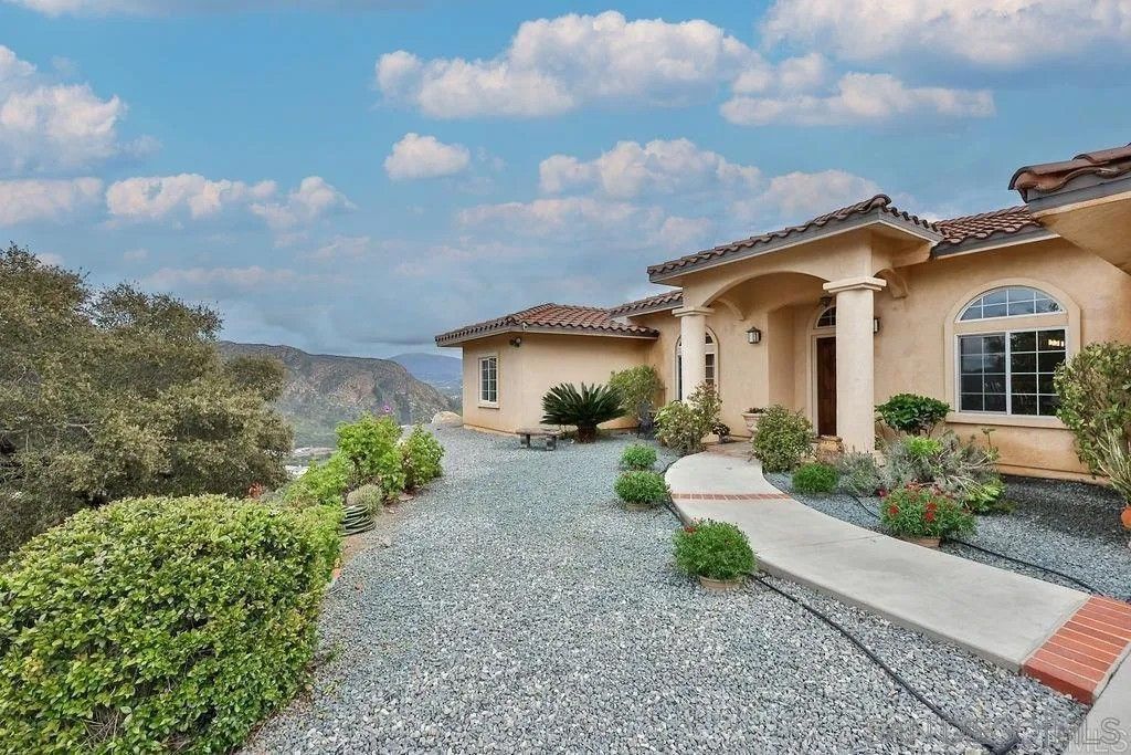 Photo of 1152 Stoneridge Dr, El Cajon, CA 92021 (MLS # 250036625)