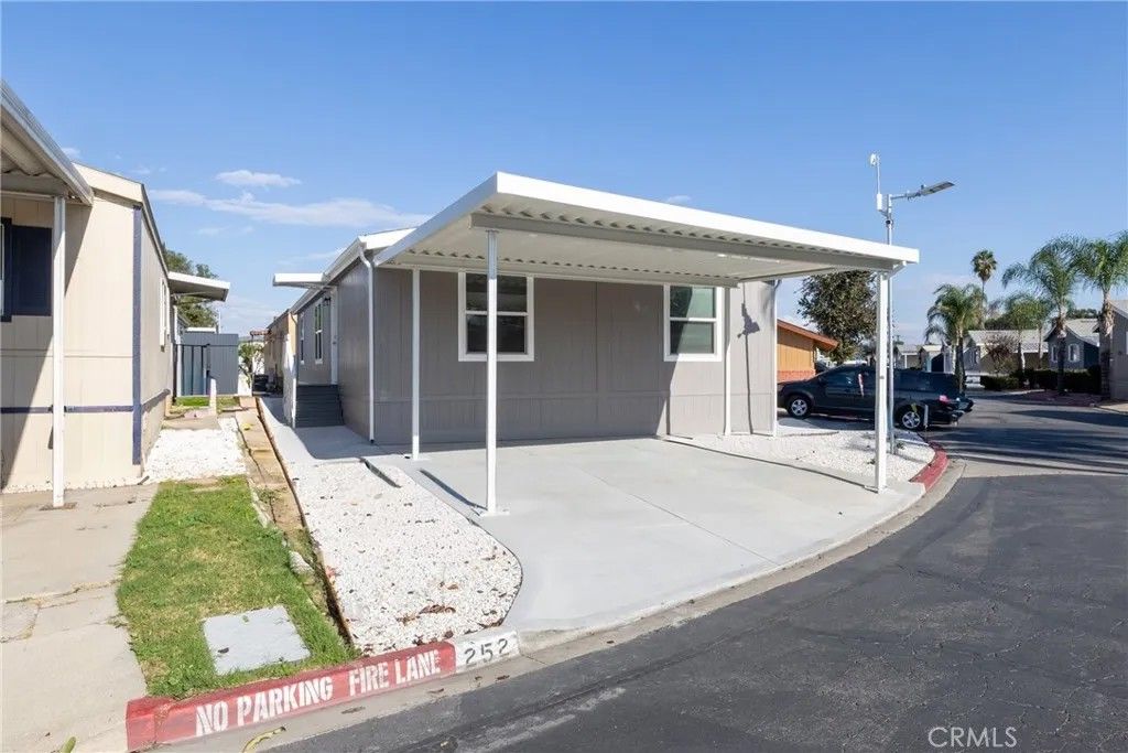 Photo of 1855 E Riverside Dr #252, Ontario, CA 91761 (MLS # CV26018156)