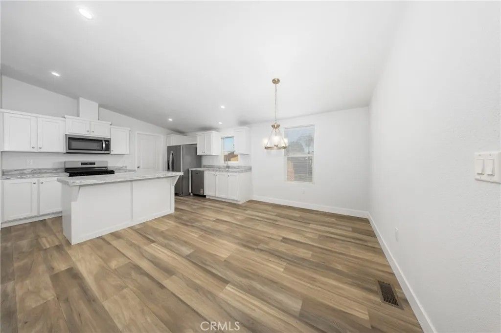 Photo of 1855 E Riverside Dr #252, Ontario, CA 91761 (MLS # CV26018156)