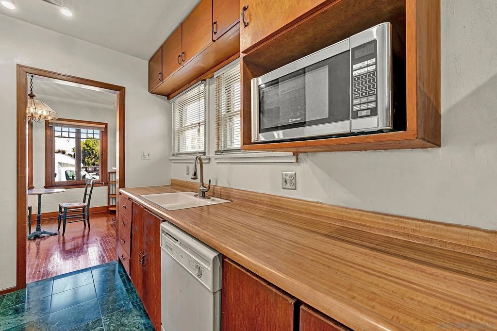 Photo of 3055 Suncrest Dr, San Diego, CA 92116 (MLS # 250045863)