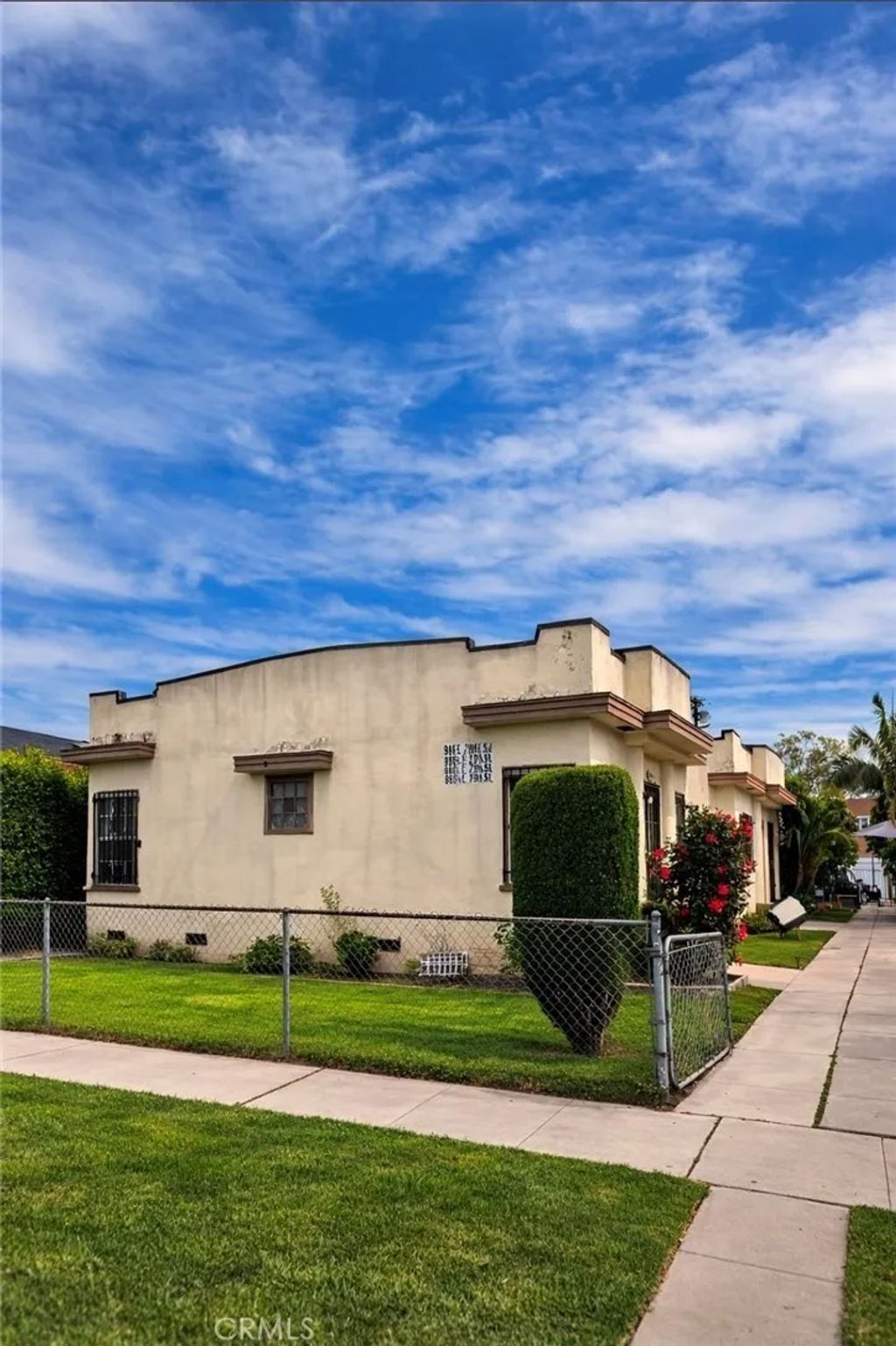 Photo of 916 E 79th St, Los Angeles, CA 90001 (MLS # CV26056097)