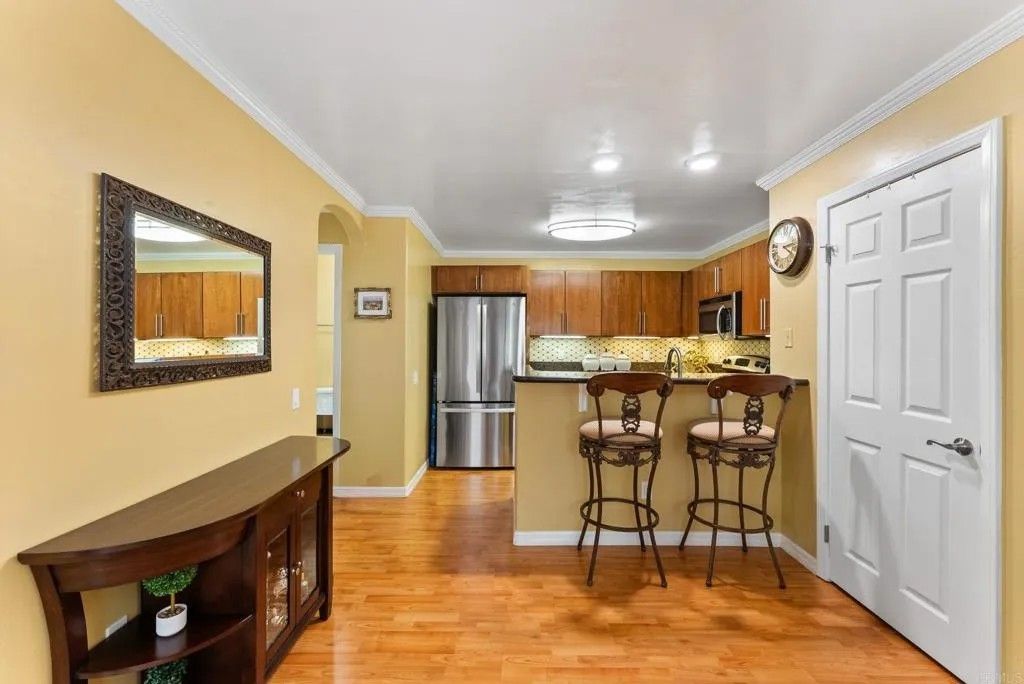 Photo of 5404 Balboa Arms Drive #352, San Diego, CA 92117 (MLS # PTP2602970)