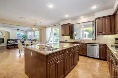 Photo of 993 Hawthorne Creek Dr, Chula Vista, CA 91914 (MLS # 260011605)