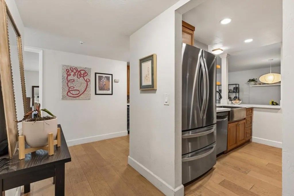 Photo of 2607 Pirineos Way #103, Carlsbad, CA 92009 (MLS # NDP2604656)