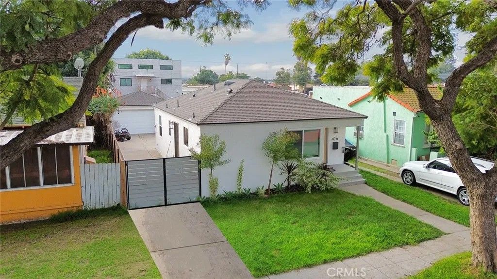 Photo of 416 E 57th St, Long Beach, CA 90805 (MLS # RS26020954)