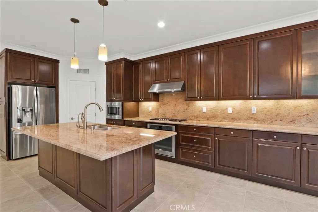 Photo of 123 Windham, Irvine, CA 92620 (MLS # OC26012426)