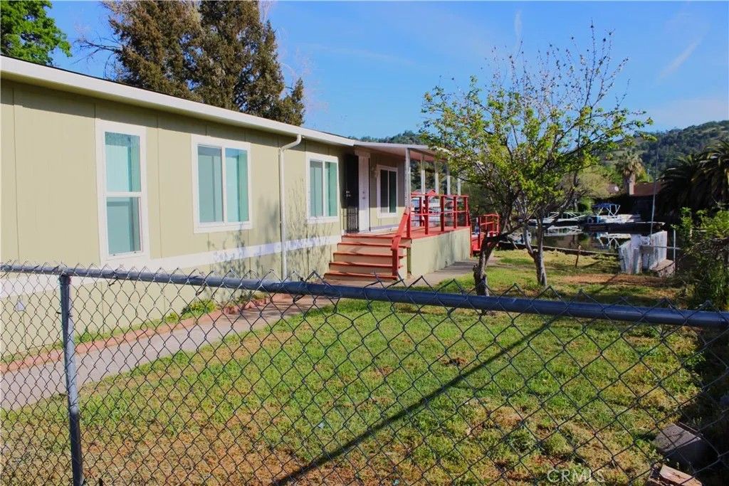 Photo of 12980 Island Dr, Clearlake Oaks, CA 95423 (MLS # LC26063184)