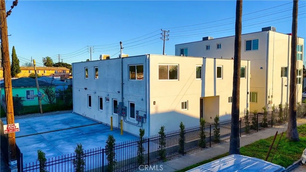 Photo of 801 E 84th Place, Los Angeles, CA 90001 (MLS # OC25235334)