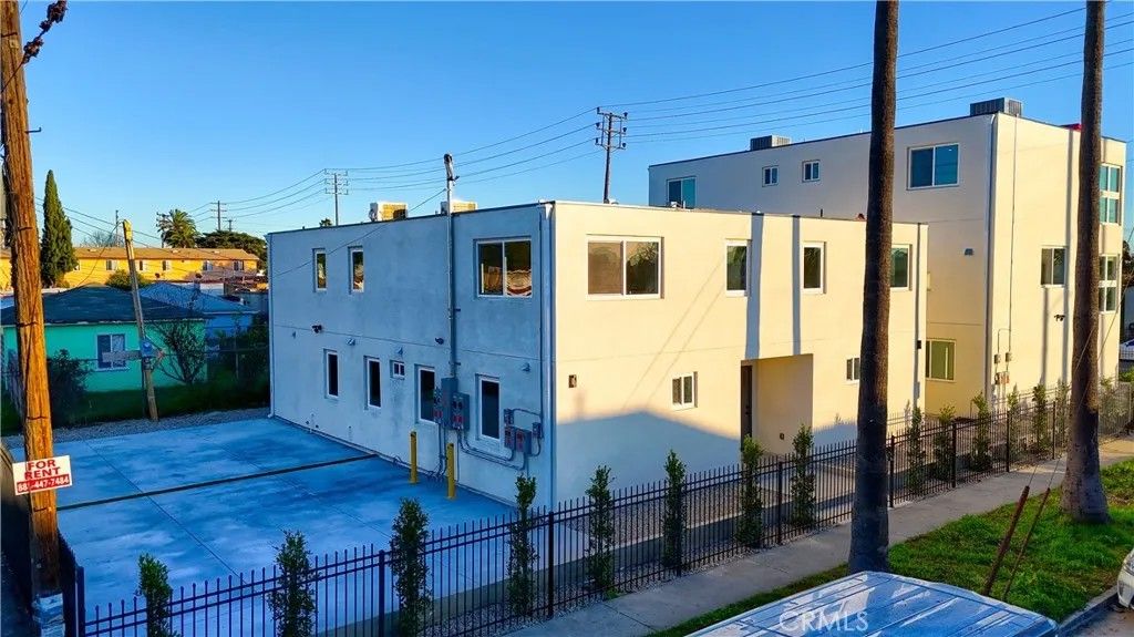 Photo of 801 E 84th Place, Los Angeles, CA 90001 (MLS # OC25235334)