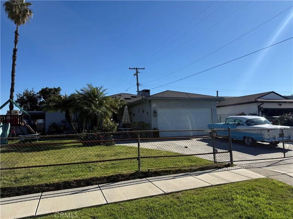 Photo of 844 Larimore Avenue, La Puente, CA 91744 (MLS # DW26013745)