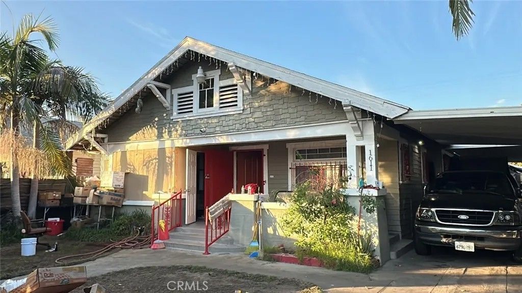 Photo of 1611 W 46th St, Los Angeles, CA 90062 (MLS # SB25277641)