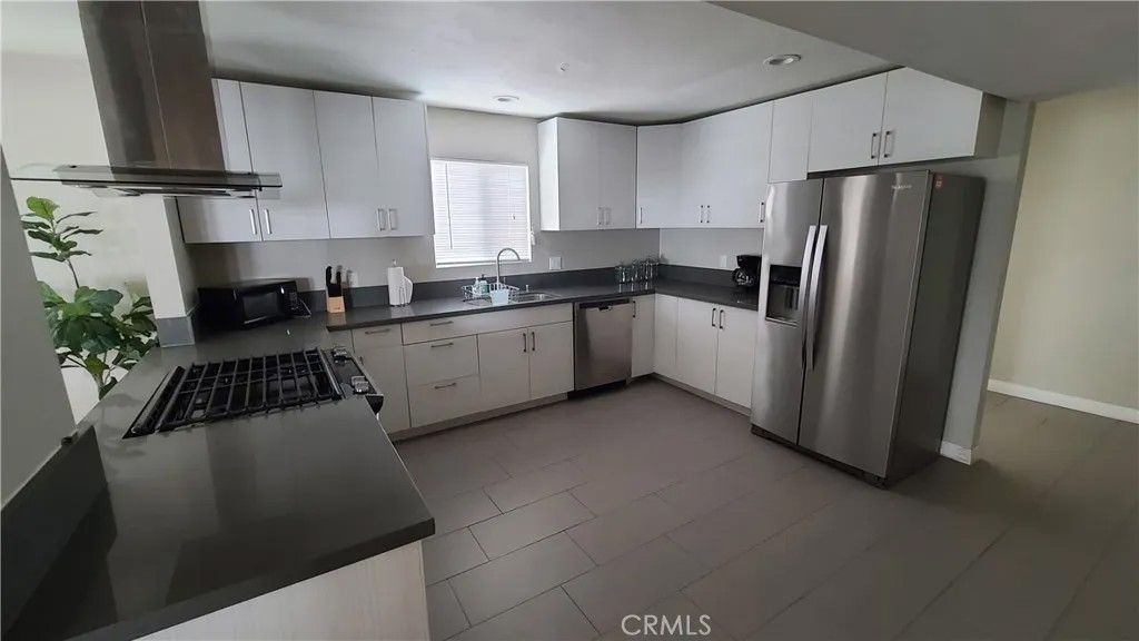 Photo of 11525 Haro Avenue, Downey, CA 90241 (MLS # SR26038412)