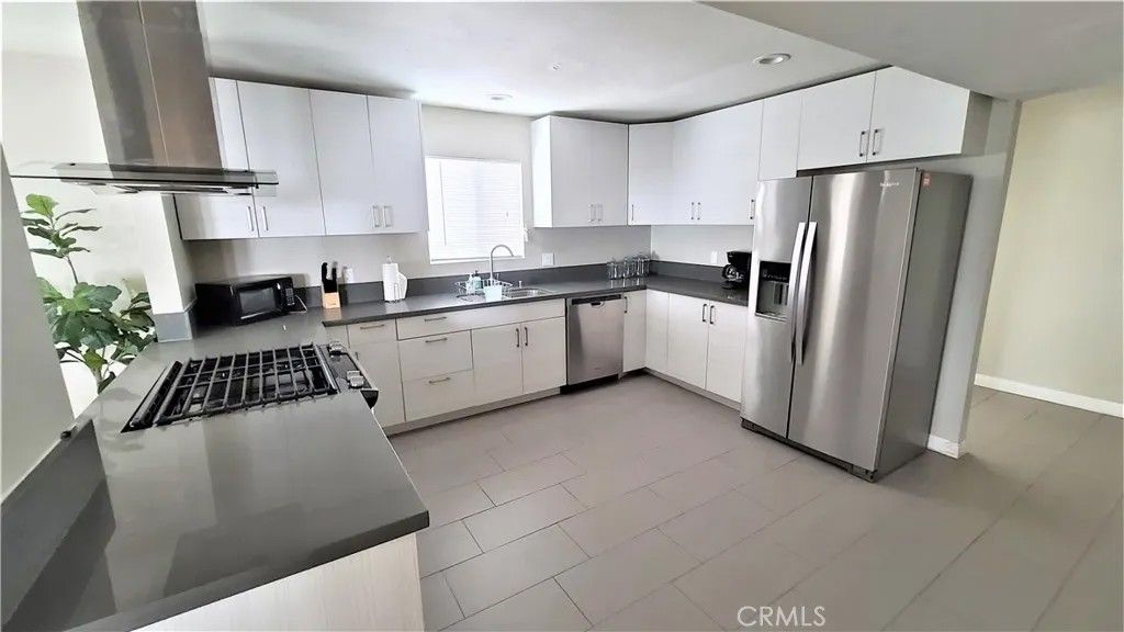 Photo of 11525 Haro Avenue, Downey, CA 90241 (MLS # SR26038412)