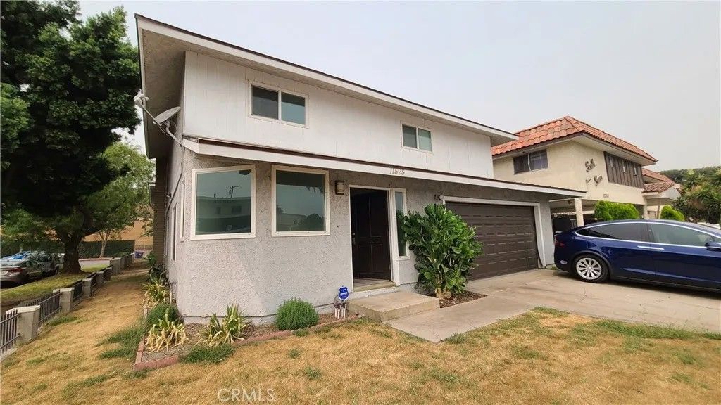 Photo of 11525 Haro Avenue, Downey, CA 90241 (MLS # SR26038412)