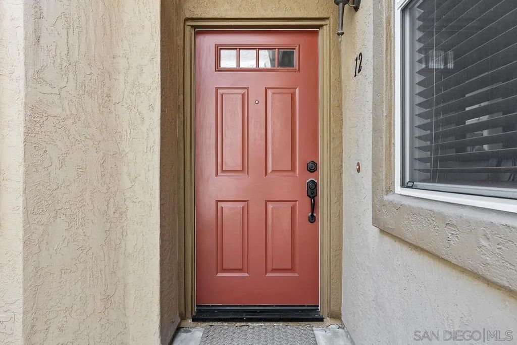 Photo of 12490 Heatherton Ct #12, San Diego, CA 92128 (MLS # 260010144)