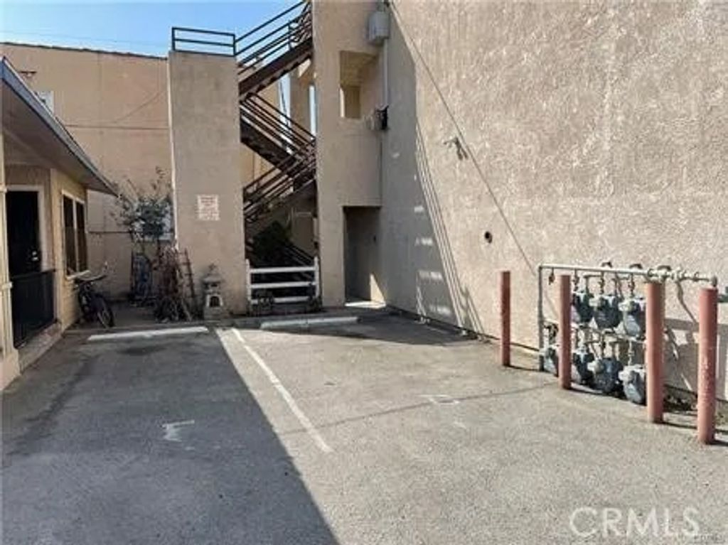 Photo of 1512 N Stanton Pl, Long Beach, CA 90804 (MLS # PW26080526)