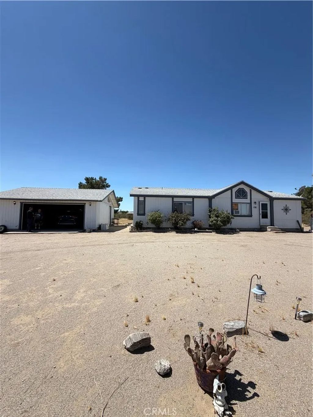 Photo of 4821 Blue Grass DR, Phelan, CA 92371 (MLS # CV26142722)