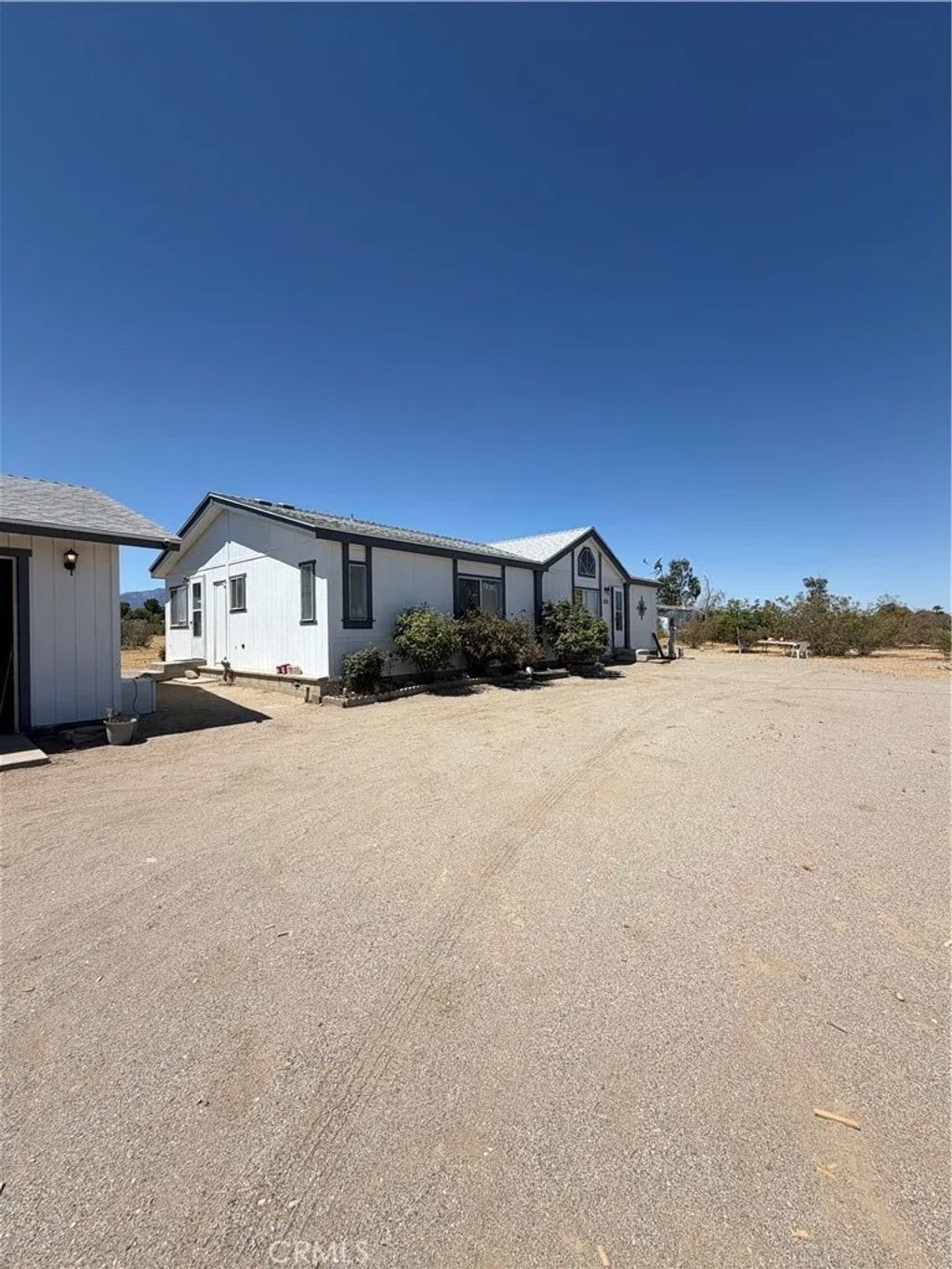 Photo of 4821 Blue Grass DR, Phelan, CA 92371 (MLS # CV26142722)
