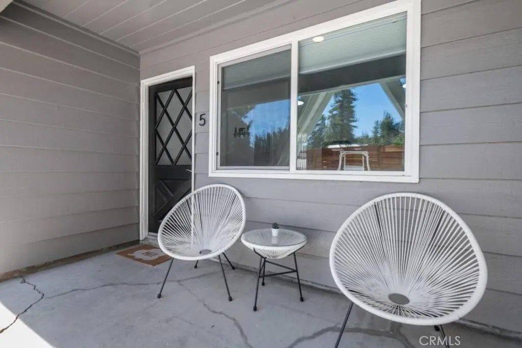 Photo of 560 Edgemoor Rd #5, Big Bear Lake, CA 92315 (MLS # LG26057599)