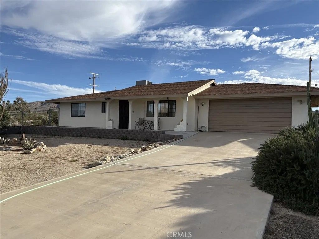 Photo of 74633 Sunset Dr, 29 Palms, CA 92277 (MLS # SW26018404)
