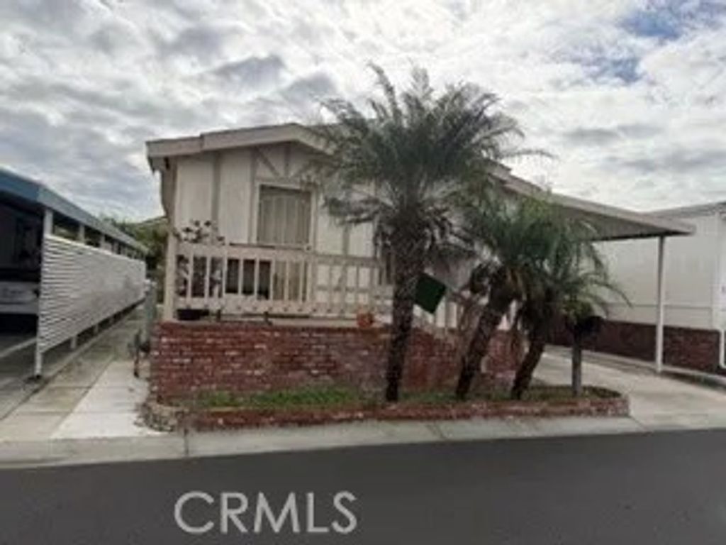 Photo of 19127 Pioneer Blvd #76, Artesia, CA 90701 (MLS # DW26002622)