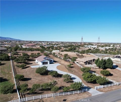 Photo of 8354 Macron St, Oak Hills, CA 92344 (MLS # HD26050953)