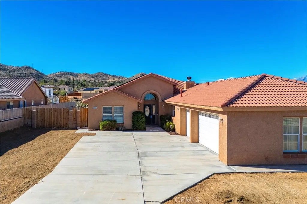 Photo of 57031 Selecta Ave, Yucca Valley, CA 92284 (MLS # JT25265793)