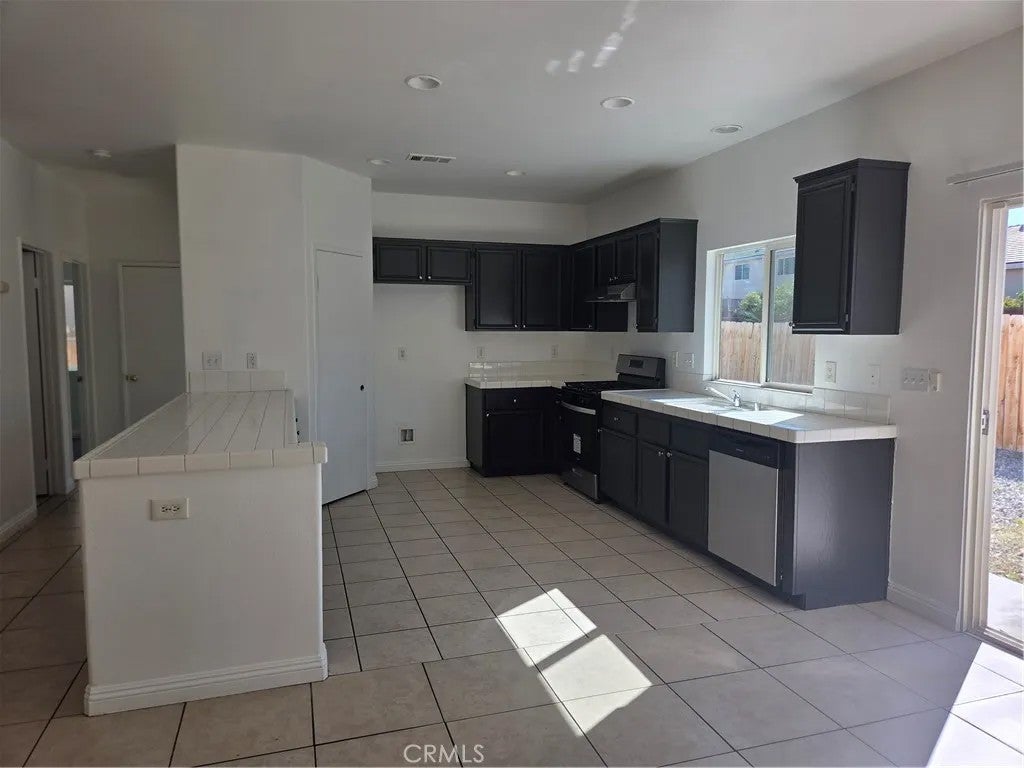 Photo of 14601 Apache Dr, Victorville, CA 92394 (MLS # WS26227817)