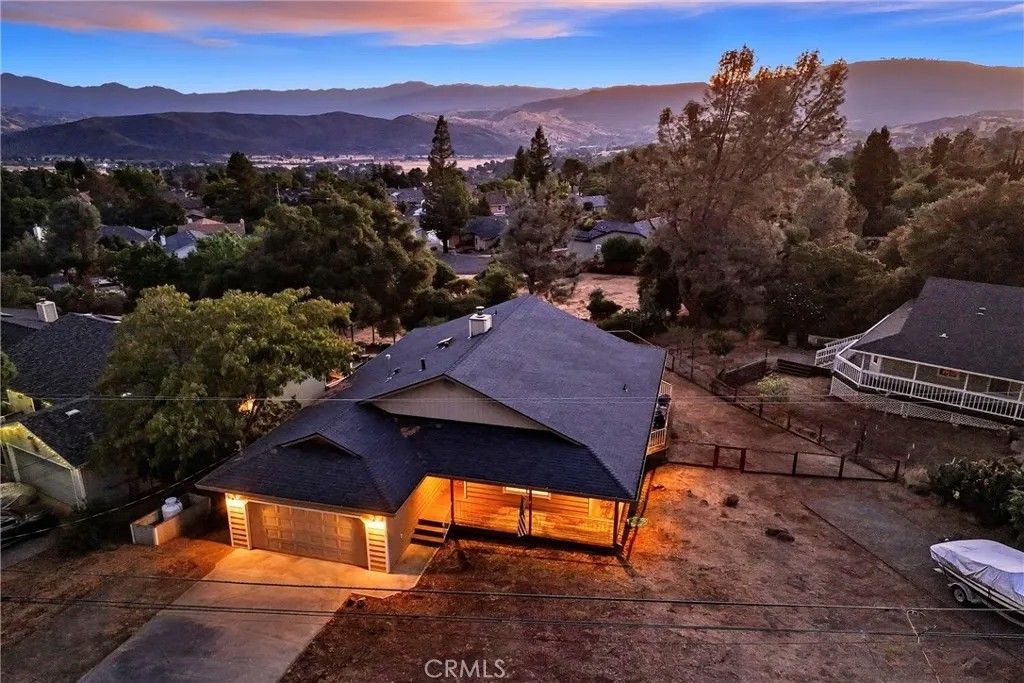 Photo of 19231 Ravenhill Road, Hidden Valley Lake, CA 95467 (MLS # LC26009343)