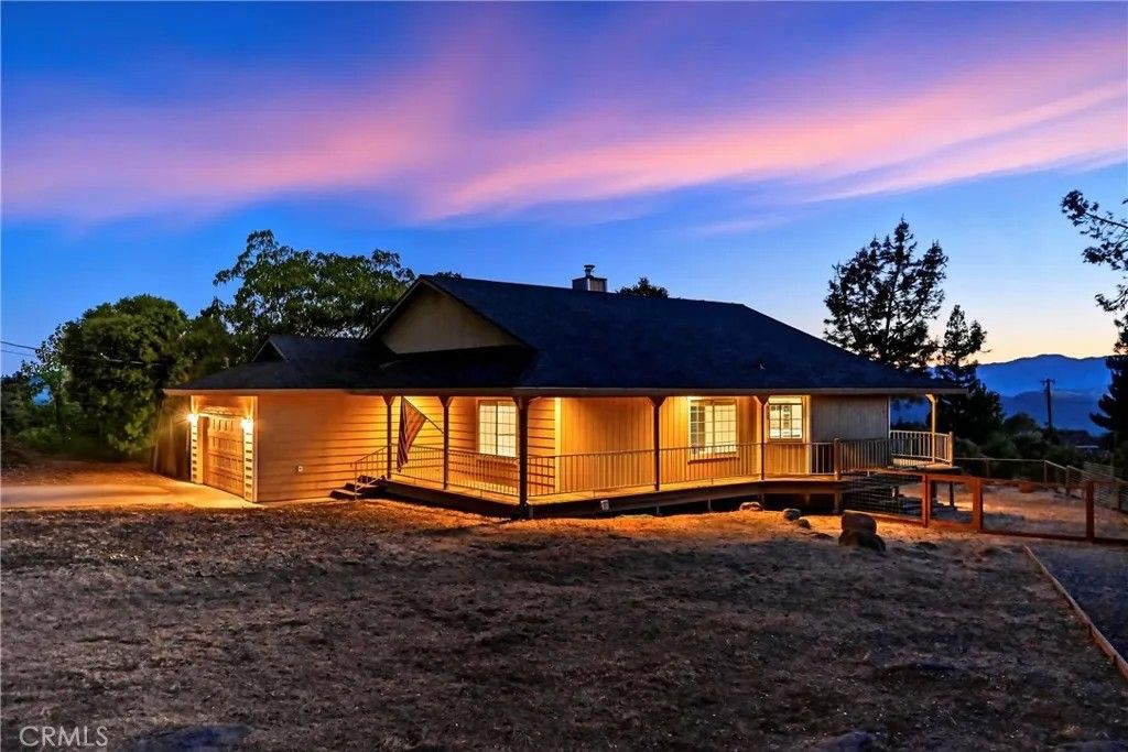 Photo of 19231 Ravenhill Road, Hidden Valley Lake, CA 95467 (MLS # LC26009343)